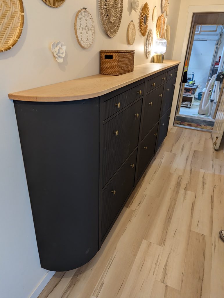Custom built-in cabinet with oak top, installed and finished